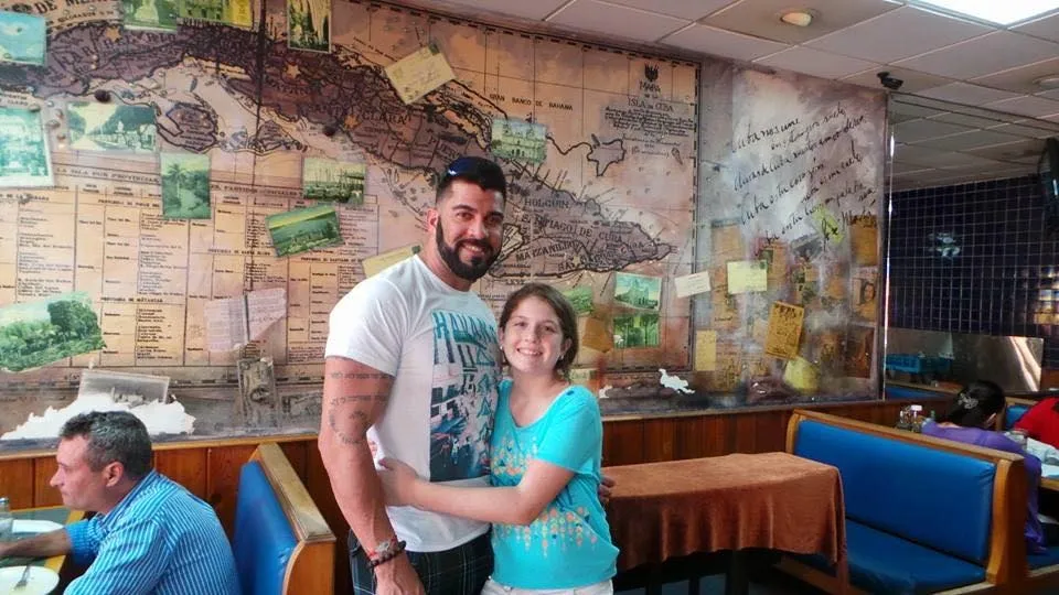 Ariam with family in Cuba